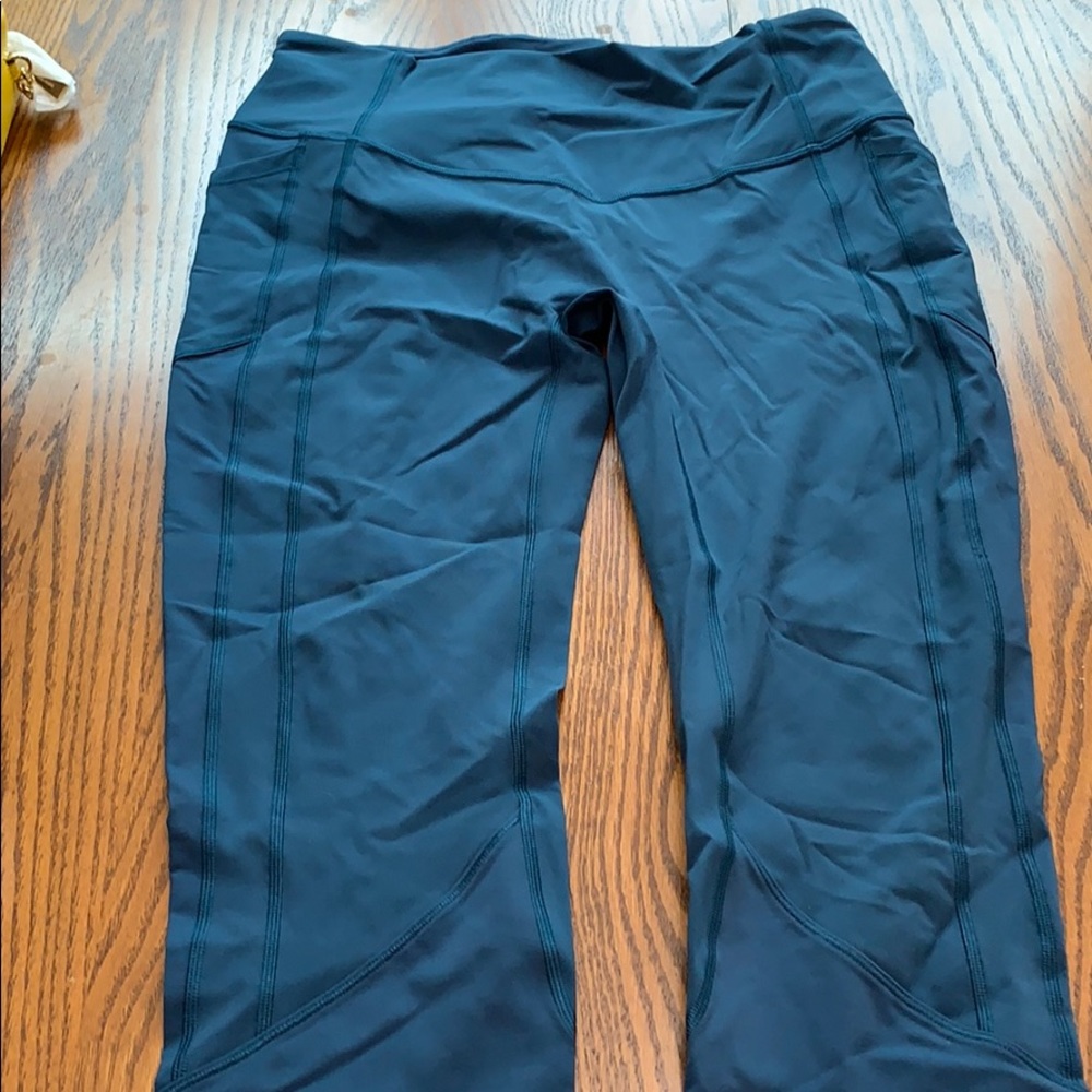 Teal Lululemon Workout pants.